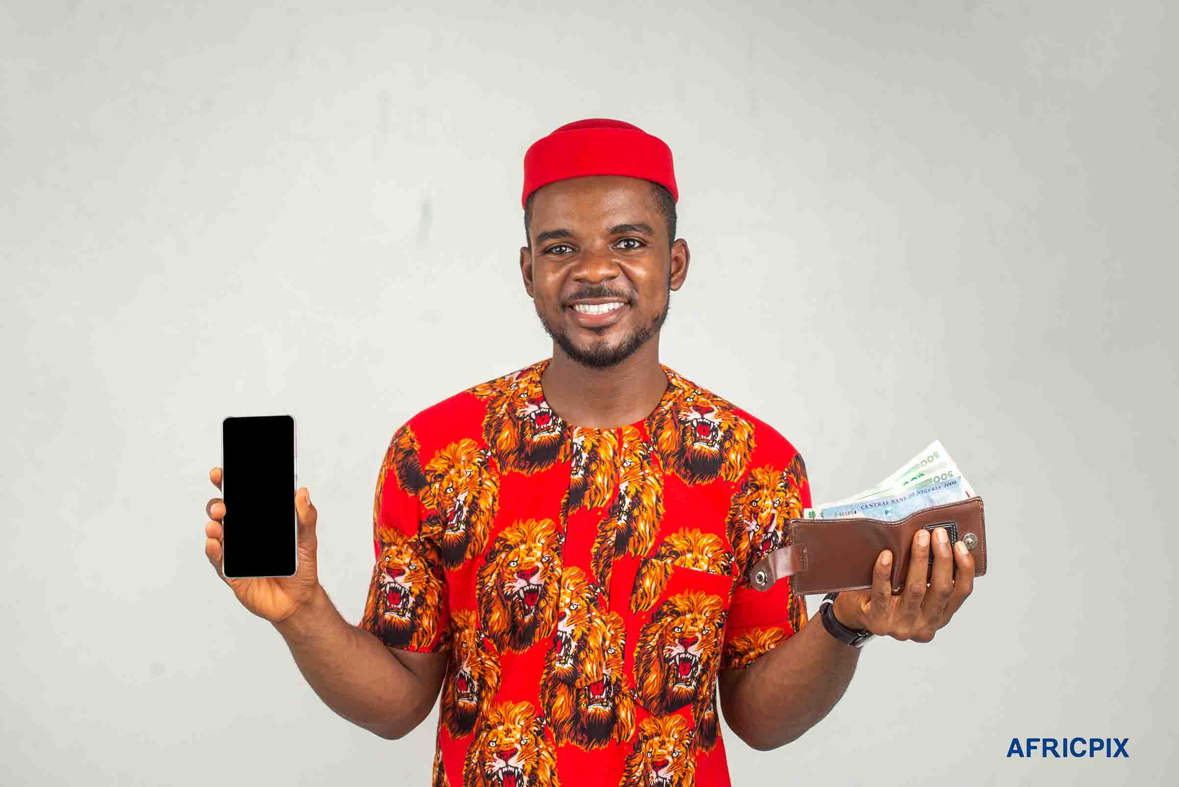 Happy Nigeria Igbo Man Holding Money and Wallet
