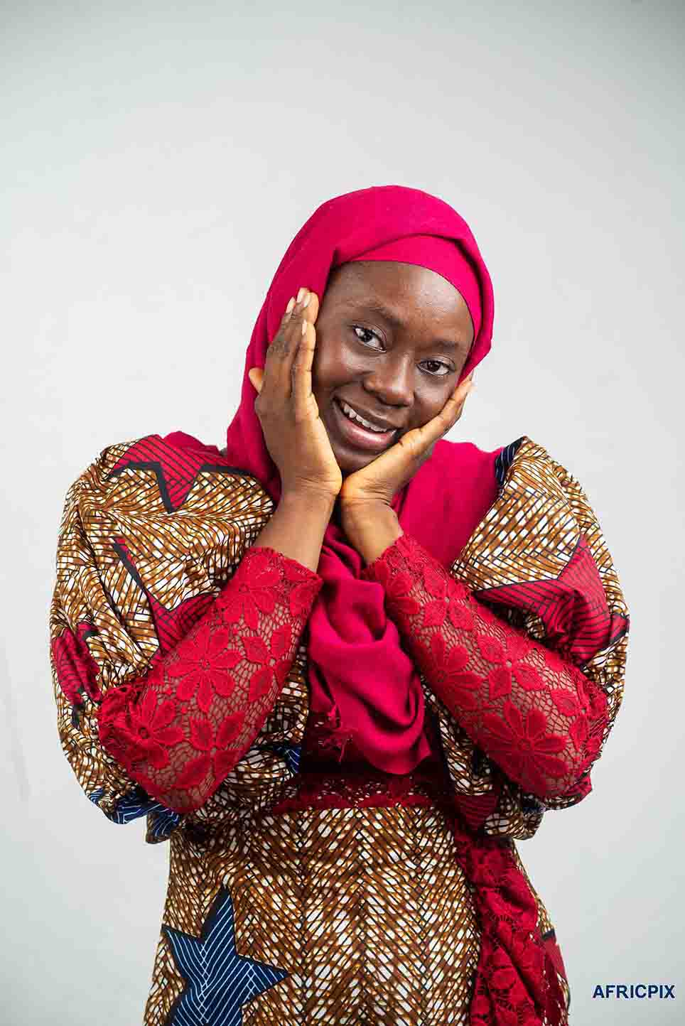 Happy Nigeria Hausa Woman hand on chicks