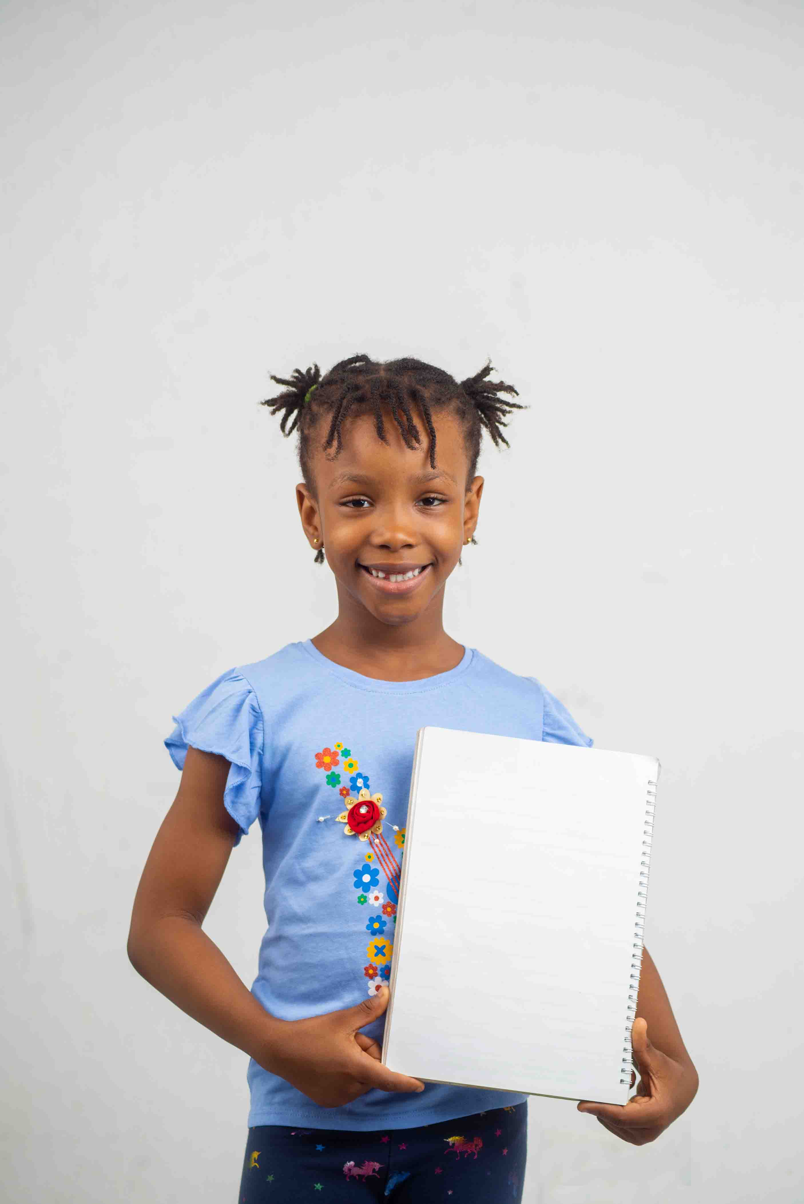 Nigeria Child Girl Holding Book