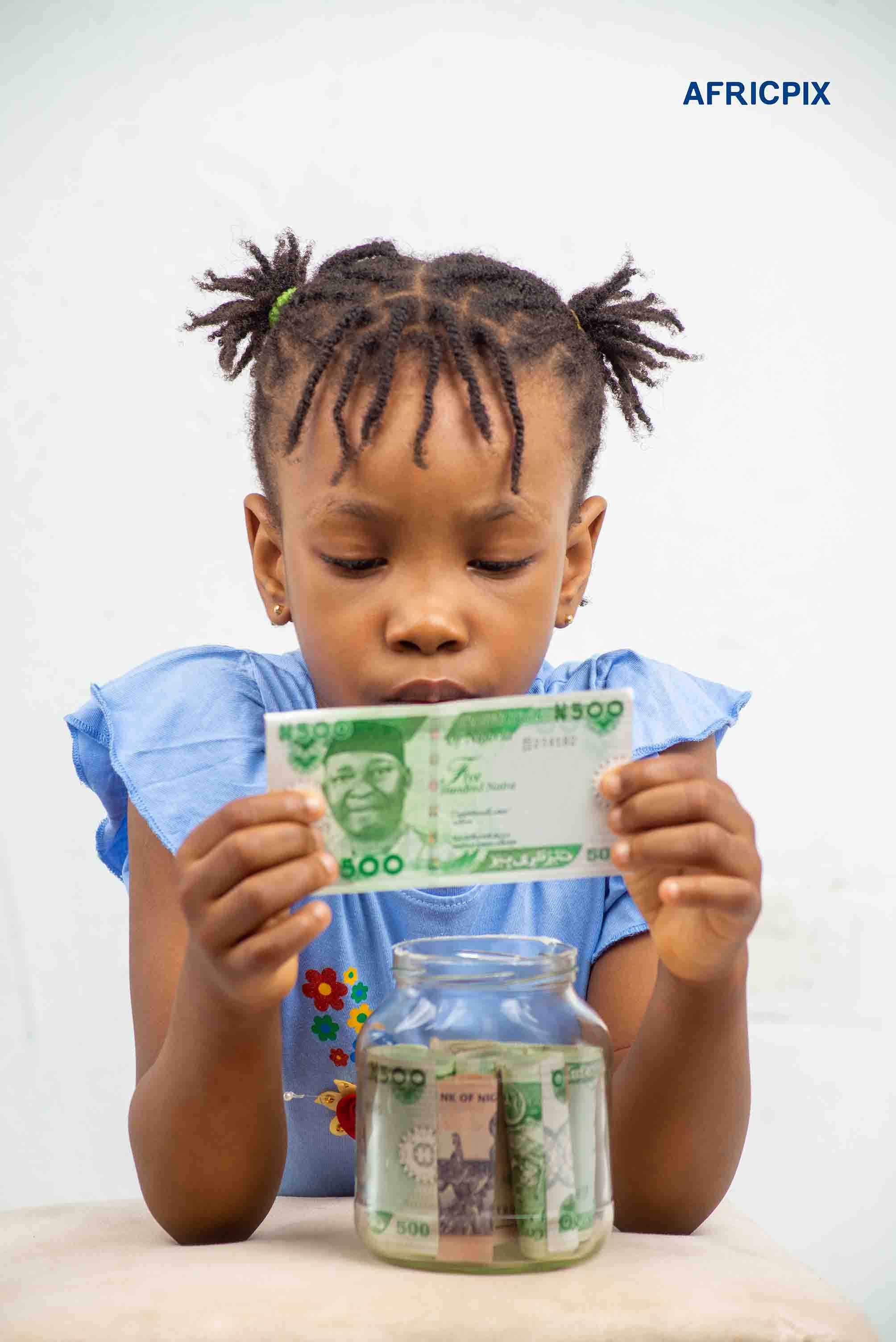Nigeria Child Girl Holding Naira Money