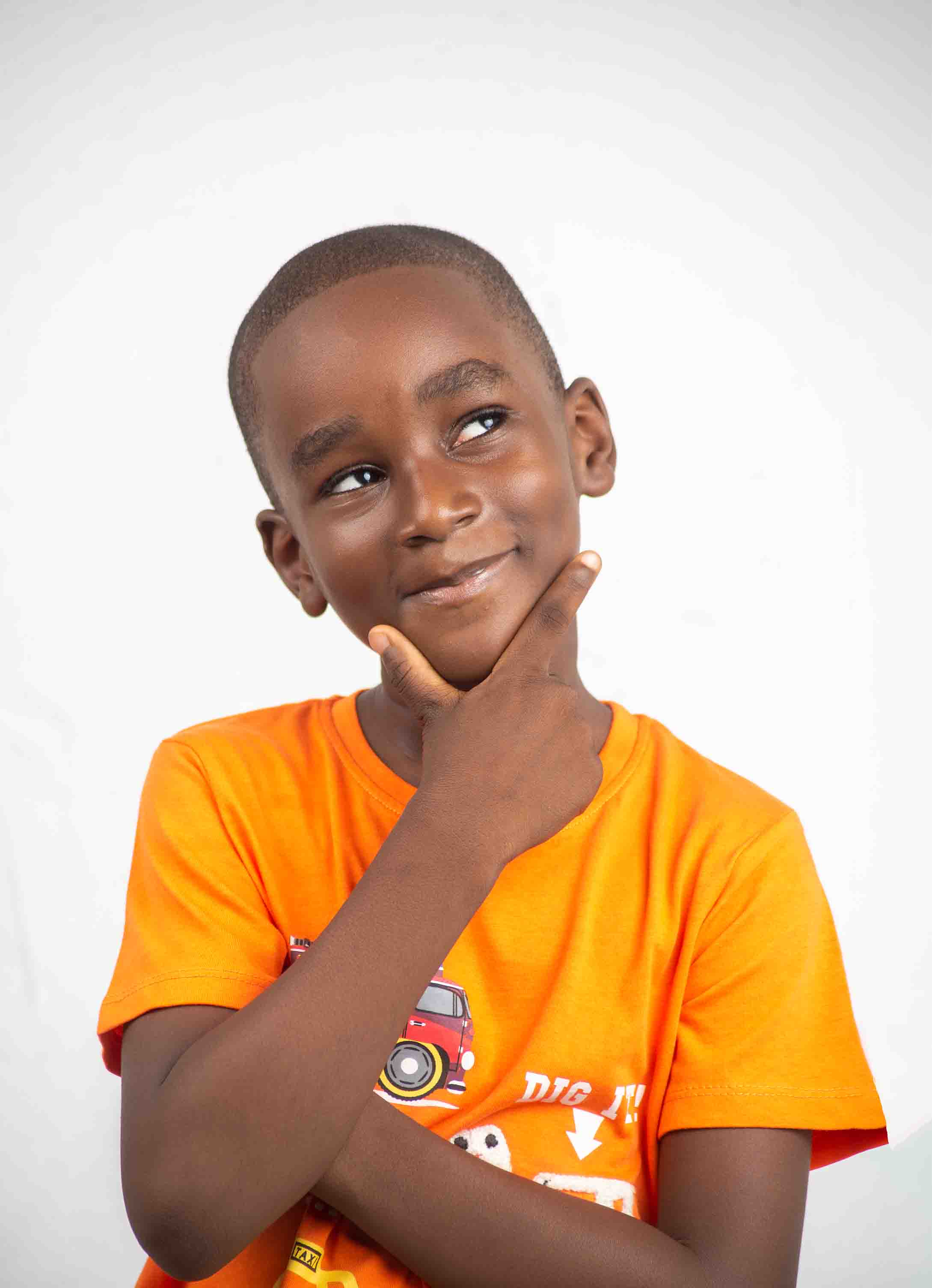 Happy Nigerian Boy Child Hands on Chicks Thinking