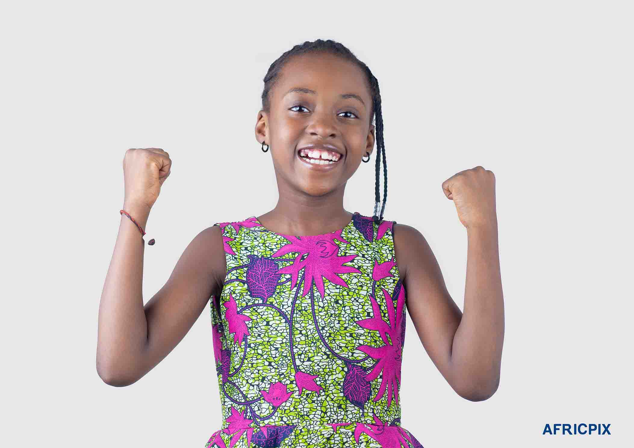 Happy Nigeria Girl Child  Wearing Native Attire