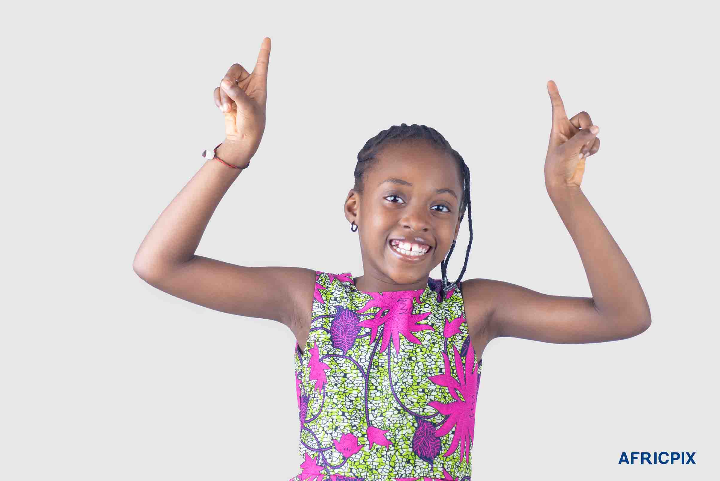 Nigerian Child Girl Wearing Native Pointing Up